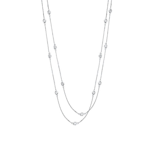 white gold necklace with bezel set diamonds stationed between white gold chain