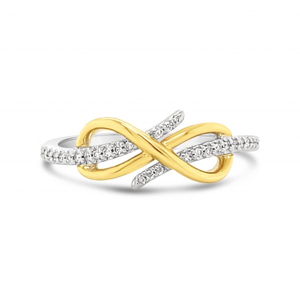 Yellow Gold infinity loop set against a White Gold and diamond band.
